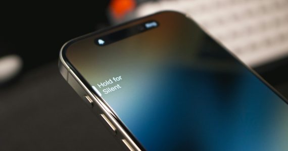 A close up of a cell phone with a keyboard in the background, illustrating phones in Ohio prisons