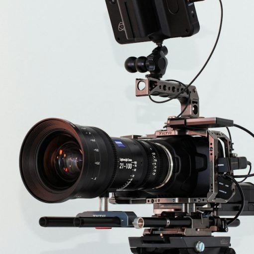Black dslr camera on white table, illustrating National Geographic's Cellphone War