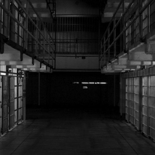 Empty prisoner cell, illustrating calls for in-cell phones from prison inspectors