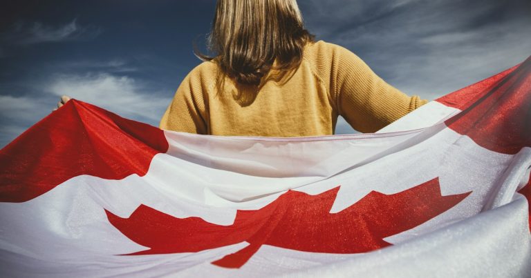 Woman holding Canada flag, illustrating dogs and high-tech prison tools
