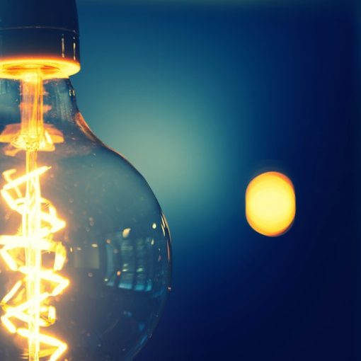 Close up photography of light bulb, illustrating disruptive innovation in prison telecom