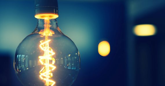 Close up photography of light bulb, illustrating disruptive innovation in prison telecom