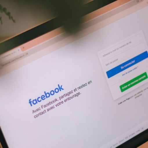 A laptop displays the facebook login page, illustrating a killer using Facebook despite jamming