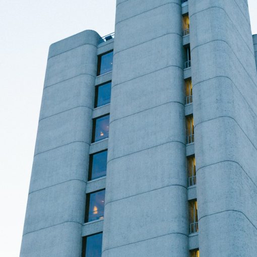 Man's eyeview of multi-storey building, illustrating an FBI sting smuggling a phone
