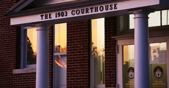 A 1903 courthouse at sunset, illustrating a court stay on FCC inmate call rates