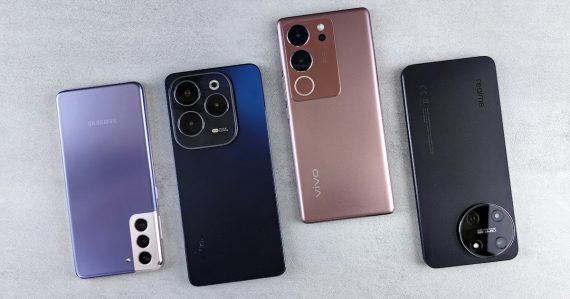 A group of four cell phones sitting next to each other, illustrating phones found in the Fulton County jail