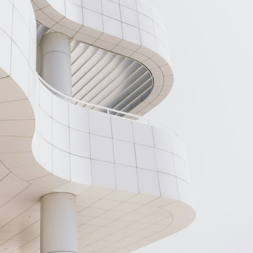 Worm's-eye view photography of concrete building, illustrating kiosks in the future prison