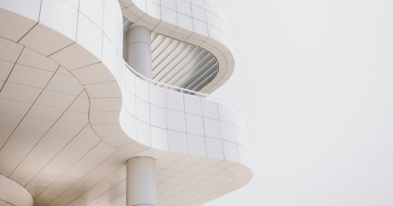 Worm's-eye view photography of concrete building, illustrating kiosks in the future prison