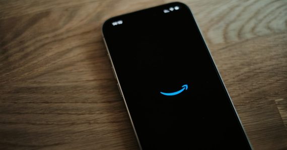 A black cell phone with a blue smiley face on it, illustrating the value of inbound calls to prisoners