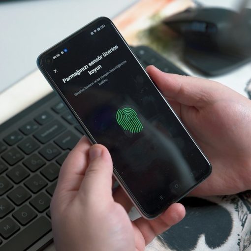 A person holding a phone, illustrating a jail phone billing glitch