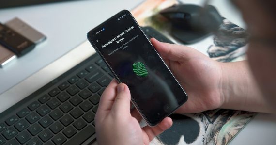A person holding a phone, illustrating a jail phone billing glitch