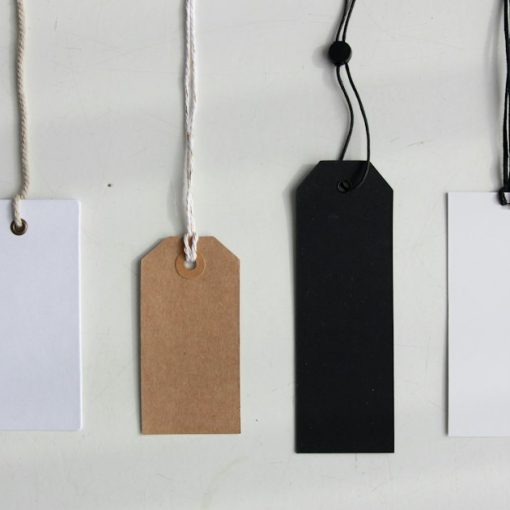 Four paper card tags, illustrating costly systems to keep phones out