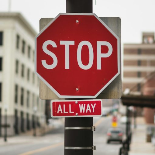 Red stop sign, illustrating California halting managed access jamming