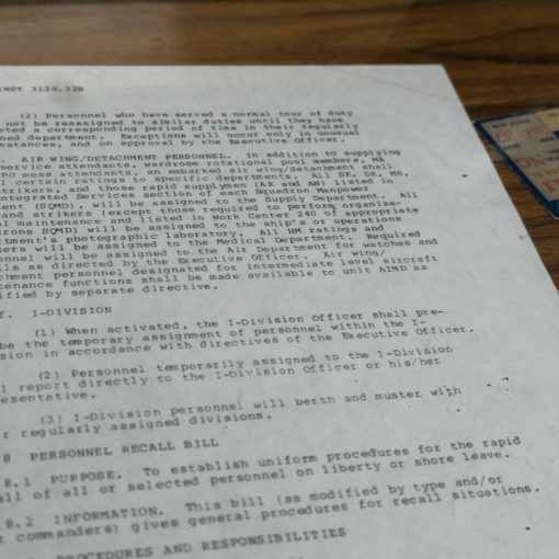 Old document with text and small card, illustrating Securus patent lawsuits