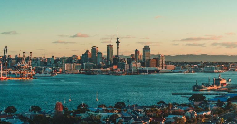 The Auckland skyline and harbor in New Zealand, illustrating fears over prisoner phone access in NZ