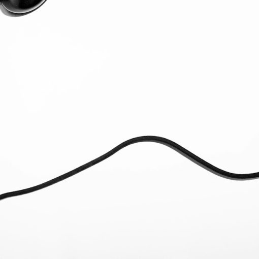 Black corded telephone, illustrating allowing phones in prison cells