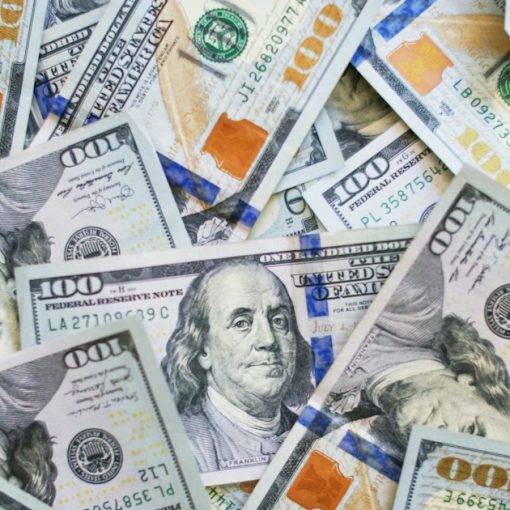 100 us dollar bill, illustrating predatory prison phone rates