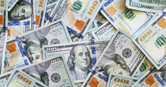 100 us dollar bill, illustrating predatory prison phone rates