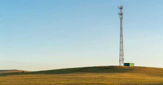 A radio tower on top of a hill, illustrating jamming failing in the Cayman Islands