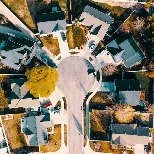 An aerial view of a neighborhood with lots of houses, illustrating jamming blocking neighbors' service