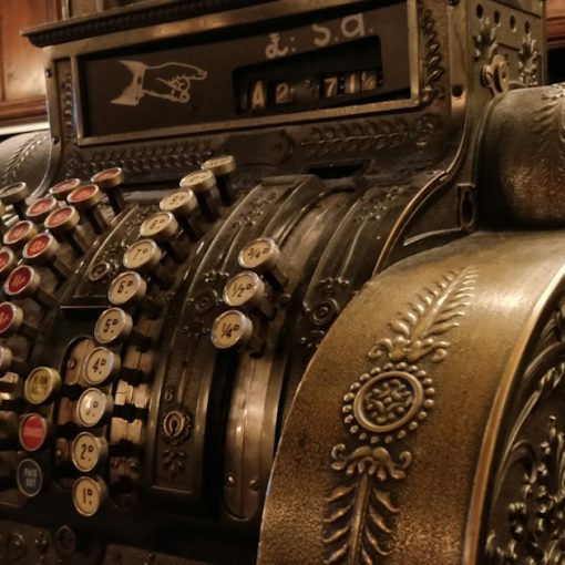Vintage cash register, illustrating prisons seeking new revenue