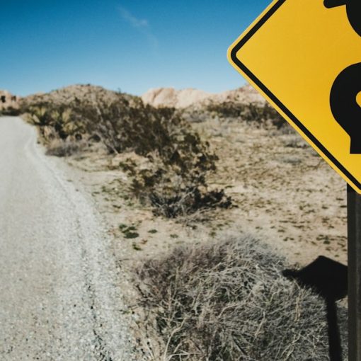Yellow road sign, illustrating lower call rates aiding rehabilitation