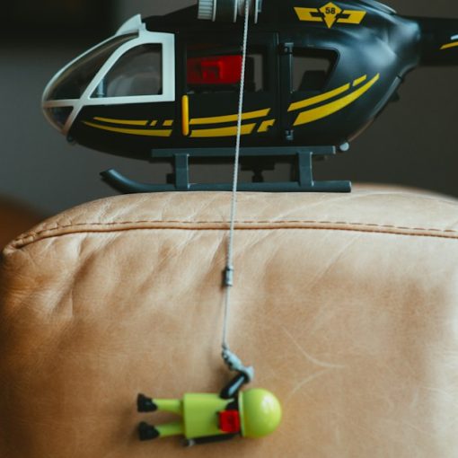 Black and white helicopter toy, illustrating a helicopter smuggling phones
