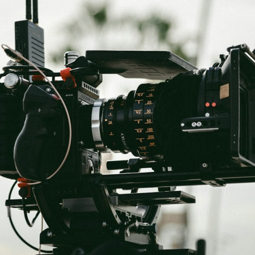 Black professional video camera, illustrating a video series on California prison phones