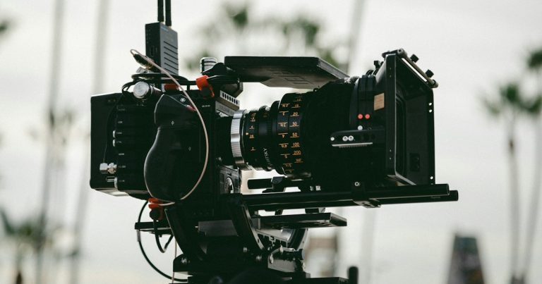 Black professional video camera, illustrating a video series on California prison phones