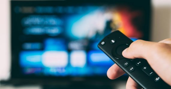 Turned-on flat screen television, illustrating TVs helping prisons manage inmates